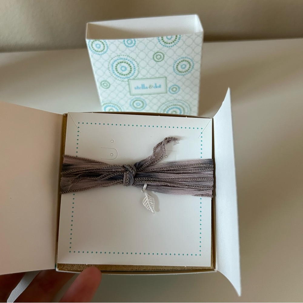 Stella and Dot Gray Silk Base Wrap Bracelet with Feather Charm